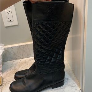Black quilted leather boots by Vince Camuto